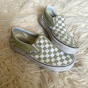 Checkered Vans slip ons